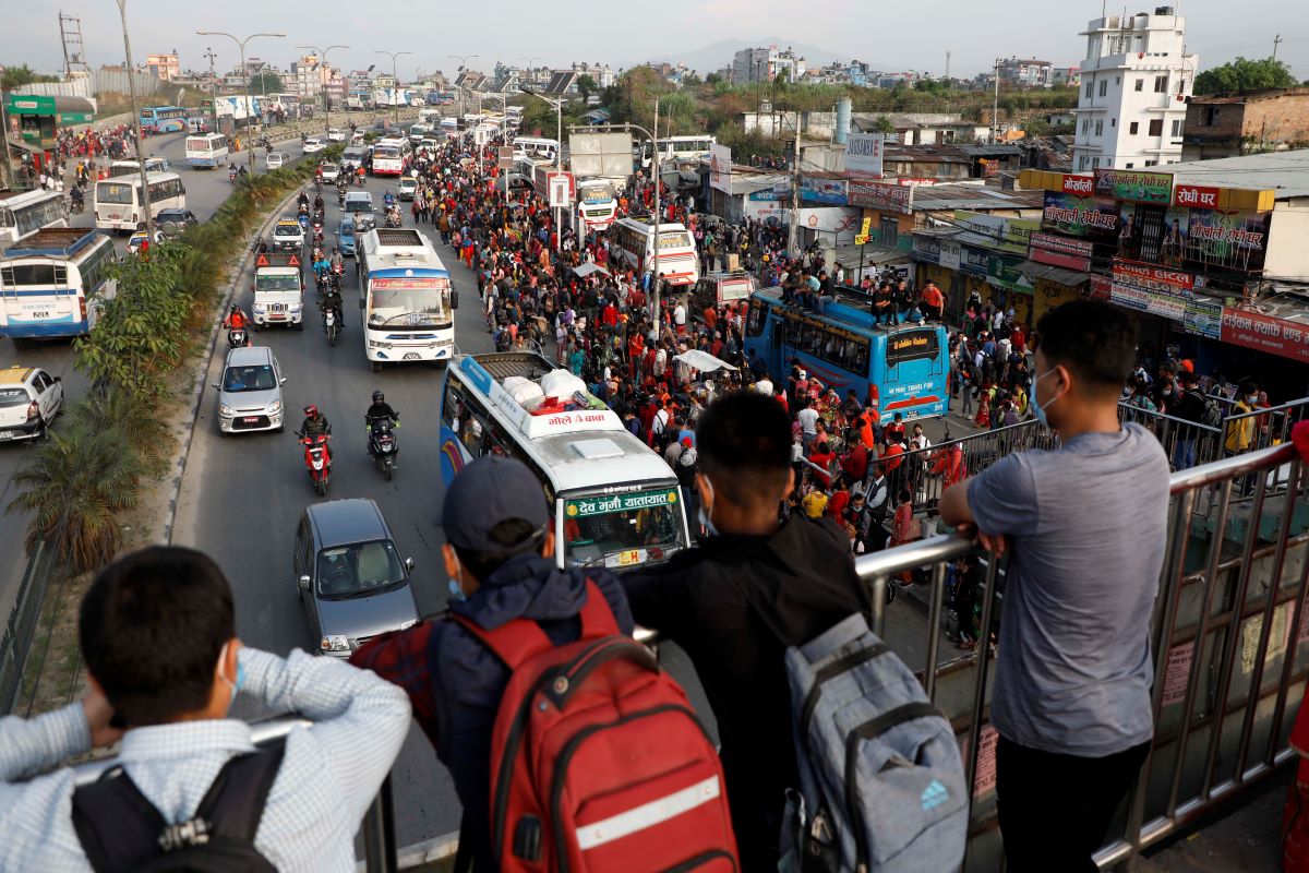 People leaving Kathmandu for home village to cast votes