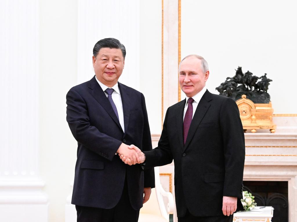 Xi meets Putin in Moscow