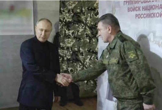 Putin rallies his troops with 2nd Ukraine visit